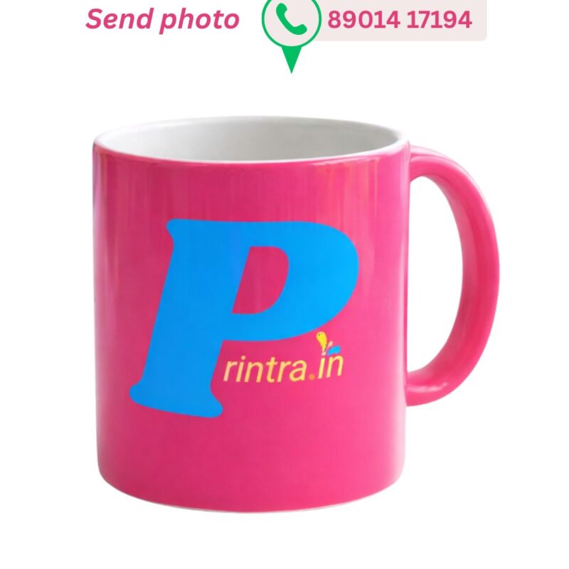 Custom vibrant pink ceramic coffee mug featuring the Printra.in blue logo