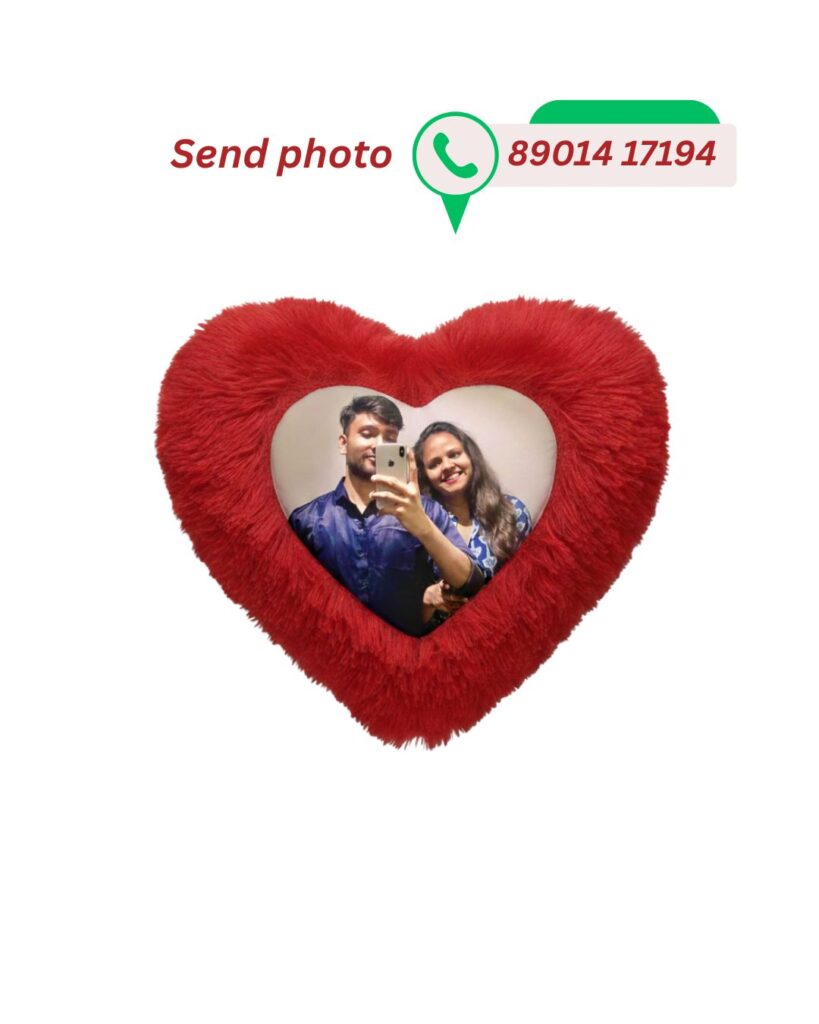 Red fluffy heart-shaped customized cushion featuring a printed photo of a couple